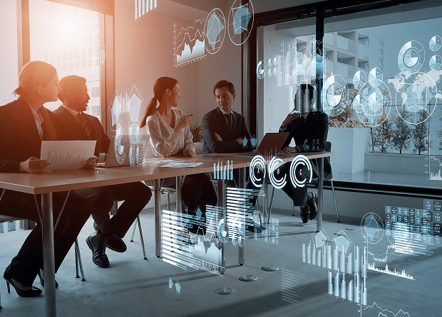 Team discussing analytics in modern office