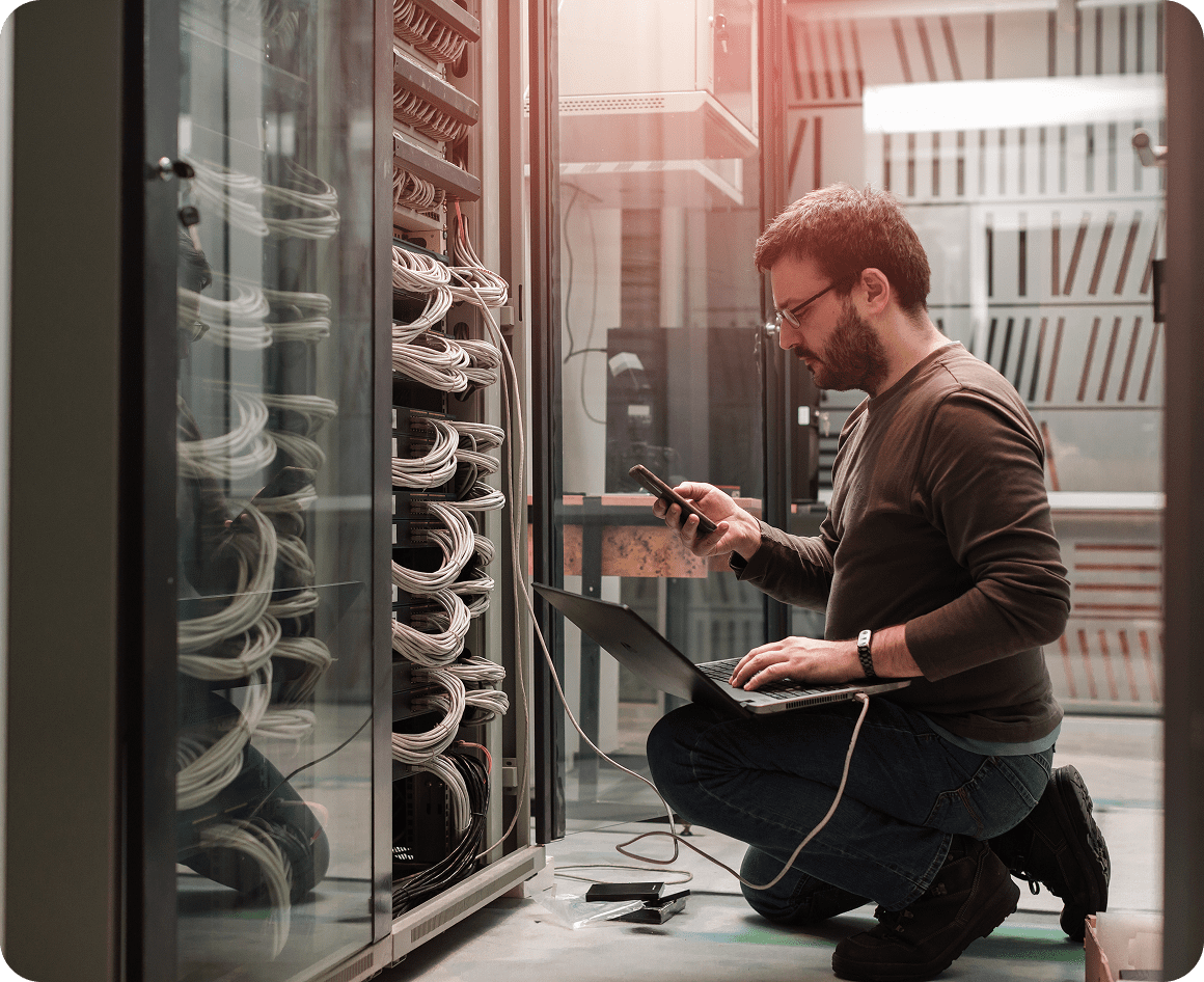 Technician working in a server room