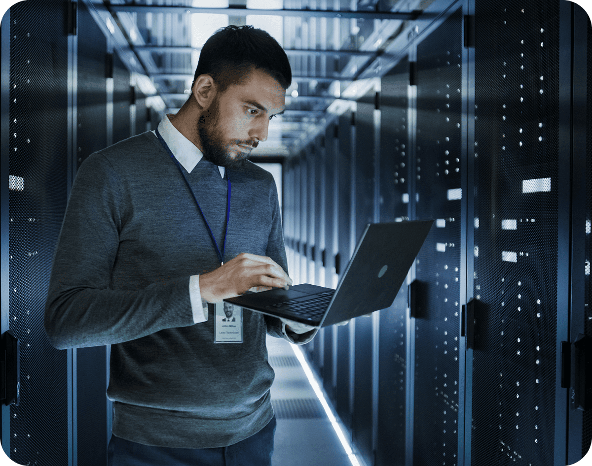 Technician working in a server room